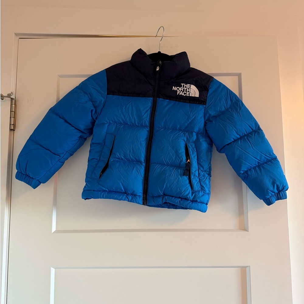 The North Face Navy Blue Jacket with Black Logo Patch